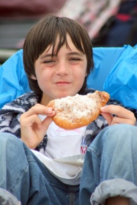 USA Kid with Black Sunken Eyes a sign of potential malnutrition Eating High Carb Pizza