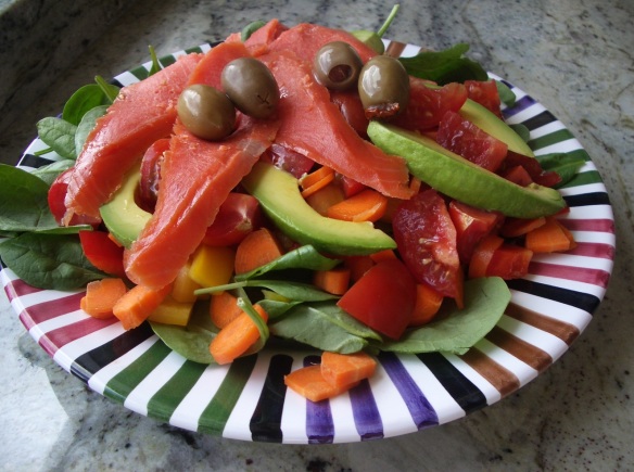 Main dish salad with wild caught smoked salmon (see Recipes), olives, avocado, chives, spinach, carrot, yellow bell pepper, and organic cold pressed olive oil and balsamic vinegar dressing. Raw foods are energy power houses. The wild caught salmon is a good source of omega-3 fat.